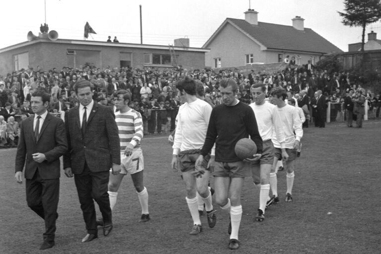 John Young leads Harps on to the pitch in our first senior game